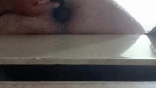 Stuffing 2 butt plugs in my ass