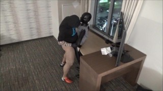 muscular silicone masked man humping dummy at hotel window