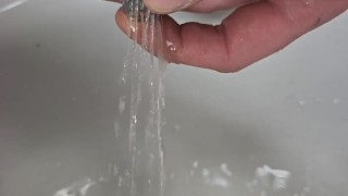 Urethral Sounding with a sprinkler end , pissing through it