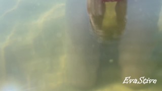 pissing and masturbating underwater at the sea public beach