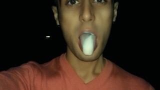 Chewing and making bubbles foam of friends cum public