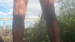 Quick piss in bare feet, long rubber gloves and dirty white shorts