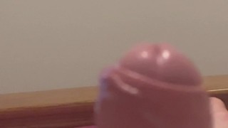 Uncut guy with big cock fingering and playing with foreskin before cumming in slo motion