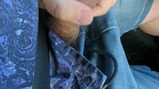 Hung bear jerks off in car driving down the freeway. Massive cumshot