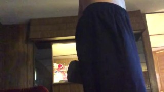 Young stud lifting weights and stripping