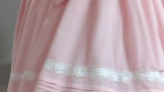 Crossdresser Wearing a Pink Dress and a Think Diaper 03