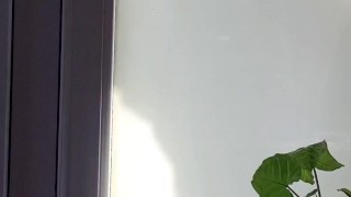 Outside my window, the builder doesn't even suspect that I'm jerking off right next to him.