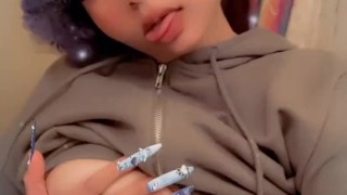 Anime girl plays with her big boobs