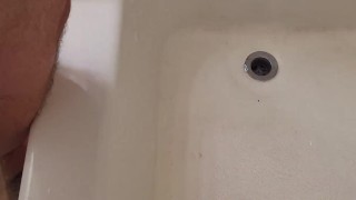 Piss fetish: Hung, hairy bear pisses all over