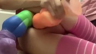 Cute femboy takes two cocks at once