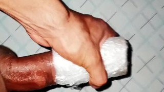 This daddy's rich oiled cock masturbates with his homemade vagina to the rhythm of the music