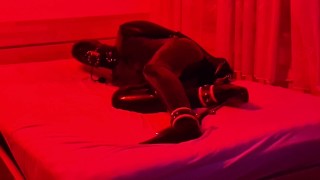 Slave trapped in latex