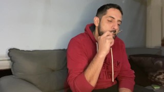 Rodrik smoking, playing with his big cock until he squirts a lot of cum, cumming a lot