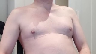 Gay playing with a anal plug