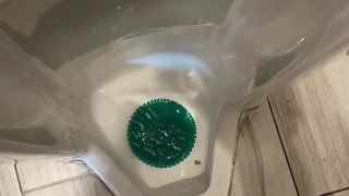 Taking A Leak In A Tall Urinal At A Gas Station