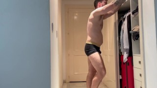 Businessman farting while he put on his suit