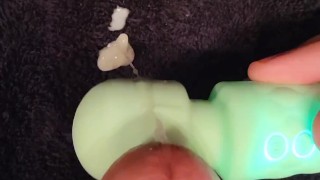 Cumshot using vibrator on soft cock