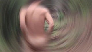 I'm outside walking naked in the woods and masturbating