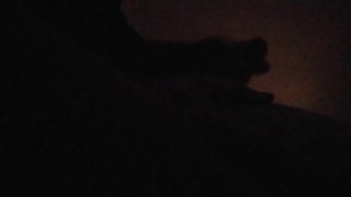 Silhouetted male masturbation