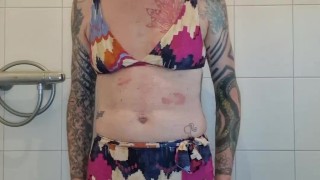 Sissy pisses in her bikini