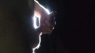 Night Exhibitionist boy on the rock stroboskop light