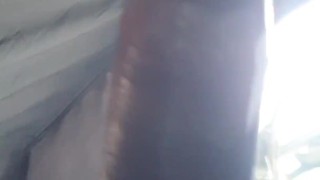 Sexy guy masturbating in a open camping tent - cock close-up