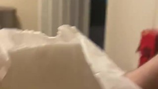 Diaper boy inserting butt plug
