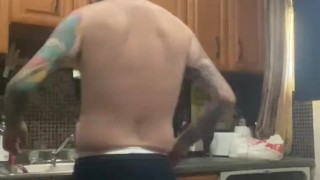 Diaper slave boy doing dishes for master with butt plug in