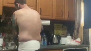 Diaper slave boy doing dishes for master with butt plug in
