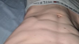 Twink with huge cock playing with his bulge