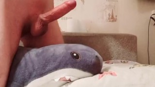 A young guy jerks off and cums in his hand
