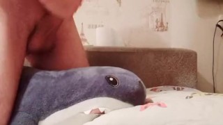 A young guy jerks off and cums in his hand