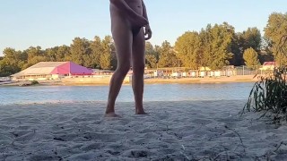 Dude pissing, jerking and cumming at nude beach