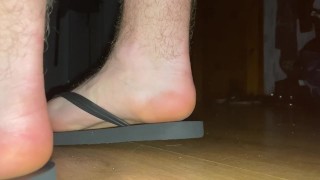 Giant boy in flip flops