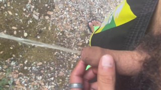 Uncut boy pissing in the wood