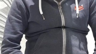 Bloke with a thick uncut pierced cock wanks off in the bathroom.