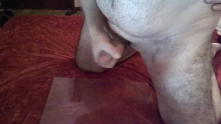 FETISH - I trample a dildo with my boots and after a handjob I play with my feet and my cum.