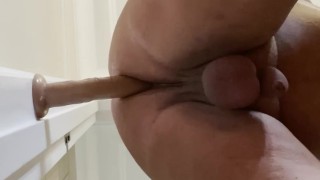 10 inch dildo goes ALL the way in !