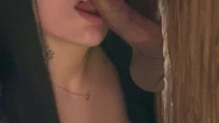 Emo teen licks cock at a glory hole
