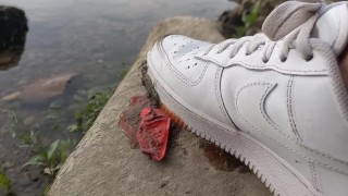 Boy crushes a ketchup packet with his new white sneakers Nike Air Force One AF1 sockless foot fetish
