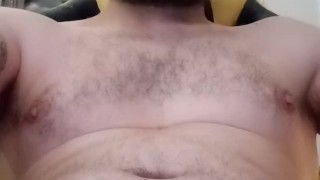 Young tattooed guy stroking