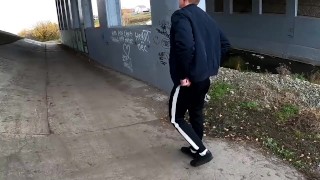 guy jerks off his dick under a traffic junction