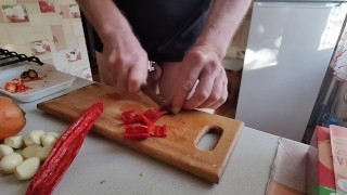 Guy with locked cock is in the kitchen