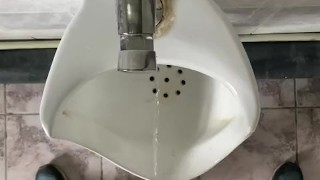 Pissing in a public toilet POV
