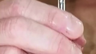 Urethral sounding in a pierced cock with cumshot!