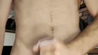 Hung Muscle jock using spit to lube up his cock and drain his balls
