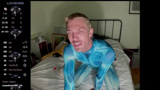 male camming model seducing viewer in his blue bedazzled superhero bodysuit (lol no homo)