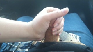 Sneaky handjob in the car, almost got caught