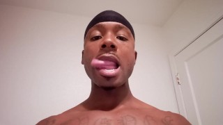 Showing off long tongue (Fetish).