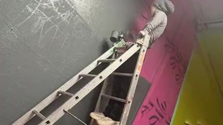 Tattooed Girl get fucked and facial while painting a wall